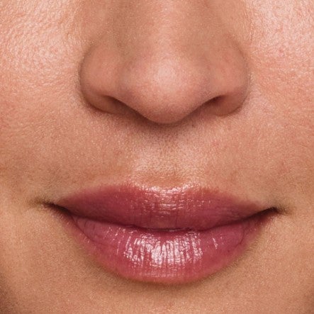 Close up of model's lips.