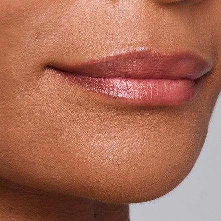 Close up of model's chin.