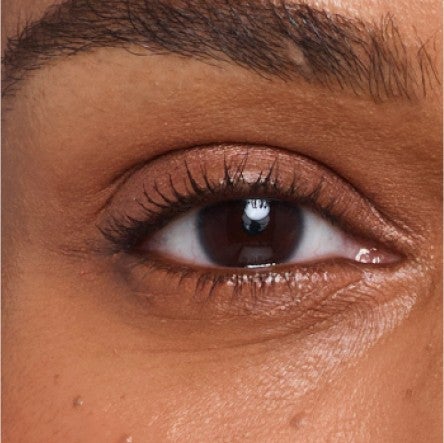 Close up of model's undereye area. 